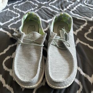 Women’s brand new in box Hey Dudes